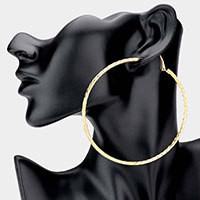 Gold Dipped Textured Metal Hoop Earrings