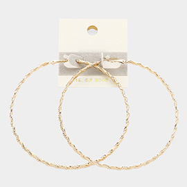 Gold Dipped Textured Metal Hoop Earrings