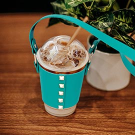 Studded Faux Leather Coffee Cup Sleeve With Strap