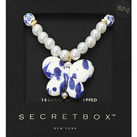 SECRET BOX_14K Gold Dipped Floral Ceramic Ball Pearl Beaded Butterfly Pendant Necklace