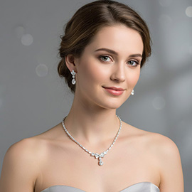 Teardrop Stone Cluster Dangle Bow Baguette CZ Stone Cluster Embellished Necklace